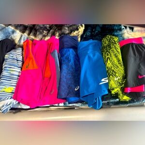 Bundle of 5 running shorts. Nike,asics,Skechers and new balance 1pink asics set.